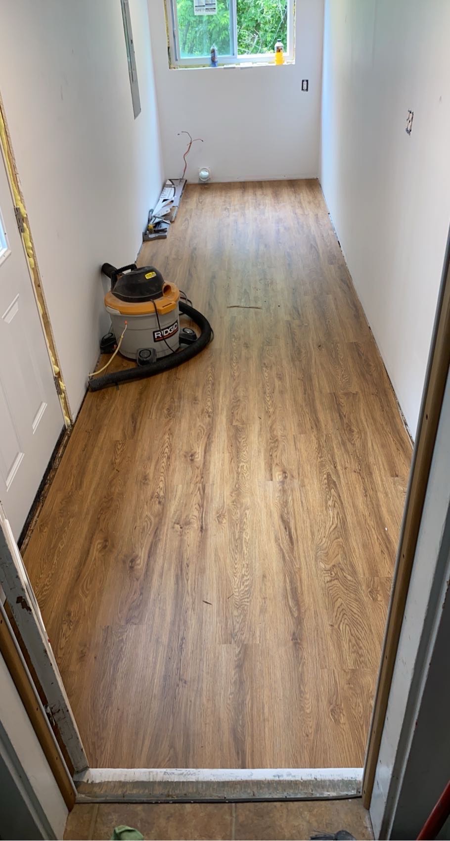 New vinyl plank flooring during a renovation